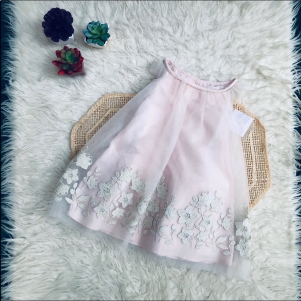 Beautiful Dress with Floral Embellished Hem
